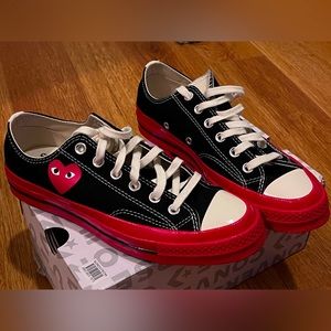A PAIR OF PLAY COMME DES GARÇONS CONVERSE